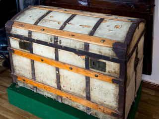 Vintage wooden chest covered with old cloth