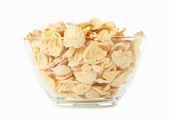 Corn flakes in bowl on white background
