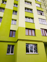 Fototapeta premium Modern panel apartment building with plastic windows and insulated walls