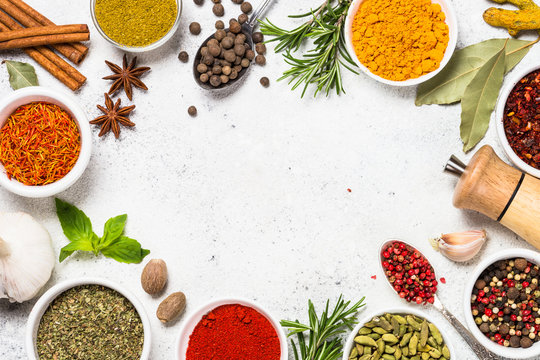 Food frame with spices on white