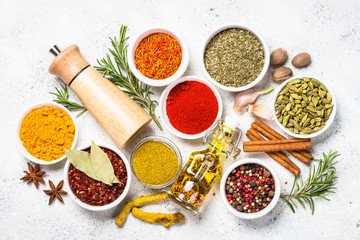 Spices on white stone table.