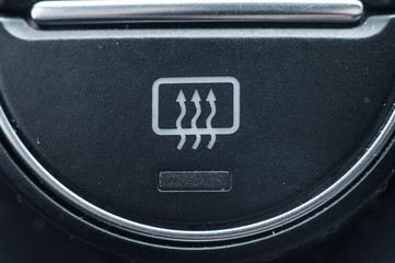 The symbol means the appearance of the function of heating the windows in the car