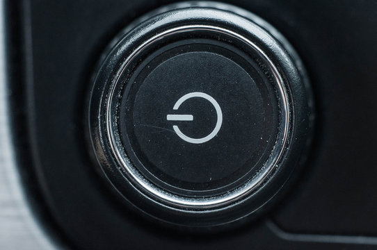 Power button with a typical symbol meaning turning on and off on a technique