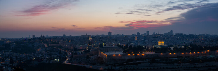 Fototapeta na wymiar Beautiful aerial panoramic view of the Old City, Dome of the Rock and Tomb of the Prophets during a dramatic sunset. Taken in Jerusalem, Capital of Israel.