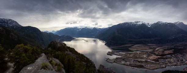 Scenic Panoramic Landscape view of the Beautiful Canadian Nature from the top of the Mountain during  a cloudy day. Taken in Squamish, North of Vancouver, BC, Canada.