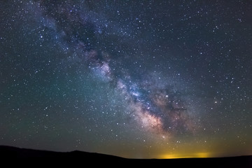milky way on a clear night in washington with a scenic landscape