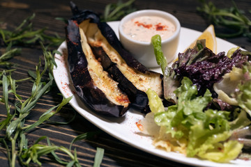 salad with eggplant and lettuce leaves