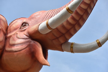 Pink elephant statue at Brahma shrine
