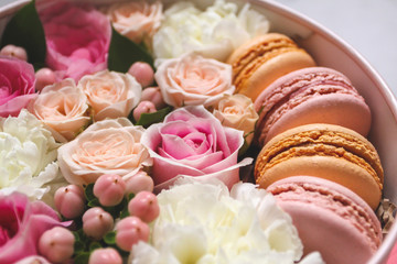 Beautiful floral background in the Box with the macaroons on top of the background