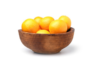 Wooden bowl of oranges on white background