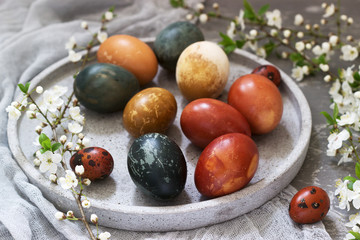 Easter eggs dyed with natural dyes, cabbage, chamomile, hibiscus and onion peel.