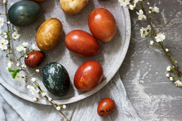 Easter eggs dyed with natural dyes, cabbage, chamomile, hibiscus and onion peel.