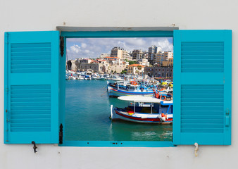 window with old port of Heraklion, Crete, Greece