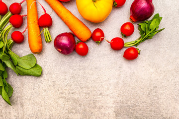 Assortment fresh organic vegetables. Food cooking stone background. Healthy vegetarian (vegan) eating concept, top view, flat lay.
