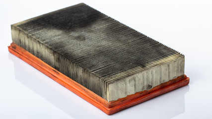 dirty car air filter, on a white background, expendable