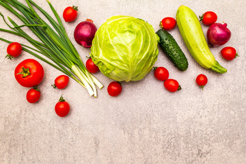 Assortment fresh organic vegetables. Food cooking stone background. Healthy vegetarian (vegan) eating concept, copy space, top view.