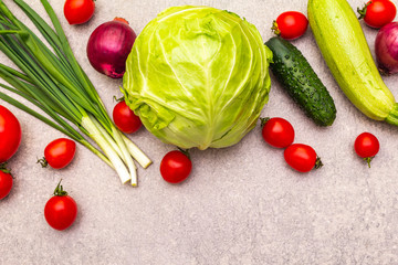 Assortment fresh organic vegetables. Food cooking stone background. Healthy vegetarian (vegan) eating concept, copy space, top view, close up.