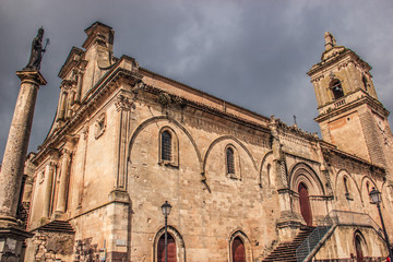 Fototapeta na wymiar Vizzini, Sicily, Italy: HDR main historic church of Vizzini, front and side view, the beauty of its characteristic baroque architecture with sky in background