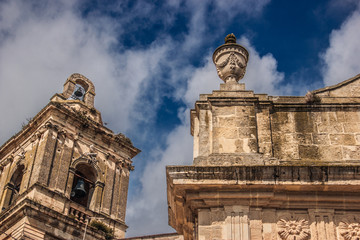 Vizzini, Sicily, Italy: HDR main historic church of Vizzini, detail view, the beauty of its characteristic baroque architecture with sky in background