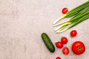 Assortment fresh organic vegetables. Food cooking stone background. Healthy vegetarian (vegan) eating concept, top view, flat lay, copy space.