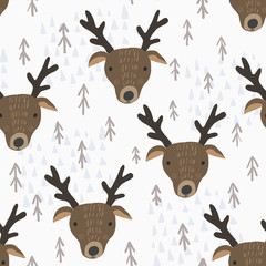 Cute seamless pattern with cartoon brown deers heads with antlers, brown fir trees and light blue mountains. Funny hand drawn moose texture for kids design, wallpaper, textile, wrapping paper