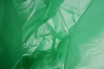 Plastic bag concept. Polyethylene may use as background. Green graphic color graphic effect background, designs element. Colourful texture.