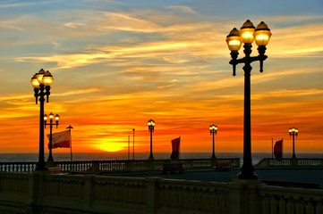 Beach sunset with lamps in Oporto, north of Portugal