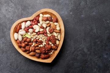 Various nuts selection on stone table