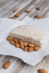 Almond vegan cheese on a wooden table