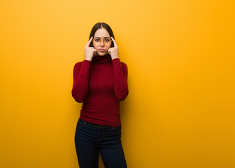 Intellectual young girl doing a concentration gesture