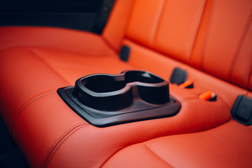 Cup holder for rear seats row