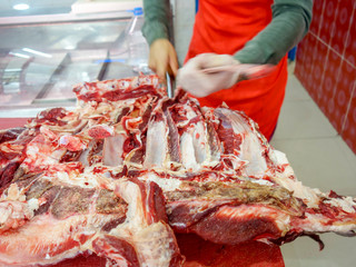 Butcher Cutting rib meat