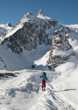 Switzerland, Grand Saint Bernard Pass, Pain de Sucre, Mont Fourchon, woman ski touring in the mountains