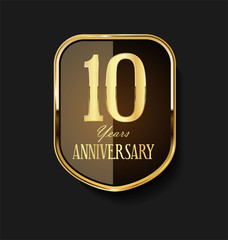 Golden shield and laurel wreath anniversary retro design 10 years 