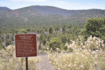 Flagstaff, AZ., U.S.A. June 5, 2018. Sunset Crater Volcano National Monument est. in 1930. Sunset Crater Volcano is a prime example of an 1,120-foot cinder volcano with substantial lava flows. 