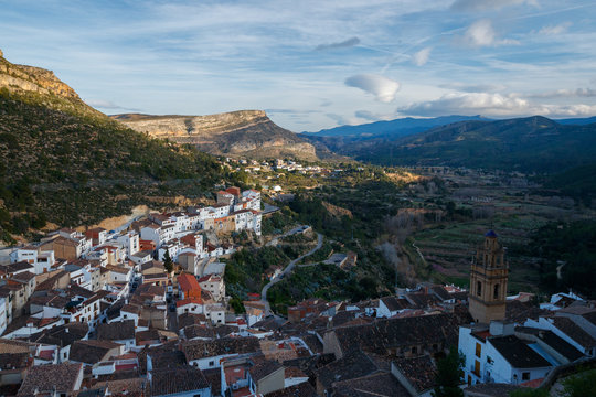 Colorful sunset over the rustic medieval town and Moorish castle of Chulilla, Spain.