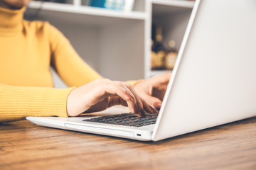 woman working in computer keyboard