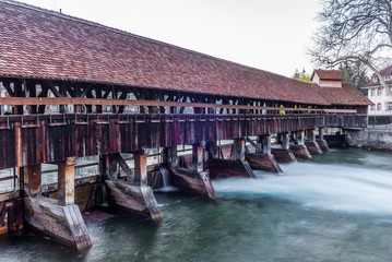 A wooden bridge crossing the river Aare in Thun  early in the morning - 3
