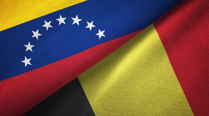 Fototapeta premium Venezuela and Belgium two flags textile cloth, fabric texture