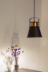 Spring flower in the glass on the table