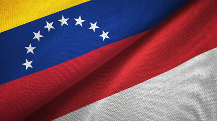 Venezuela and Indonesia two flags textile cloth, fabric texture