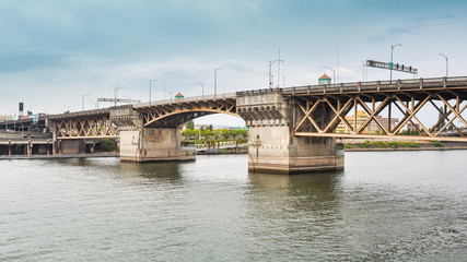 Fototapeta na wymiar Burnside Bridge - Bascule bridge that spans the Willamette River, Portland, OR. It is listed in the National Register of Historic Places.