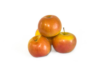 Apples red green yellow ripe on a white background.