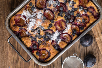 Yeast cake with plums and blueberries.