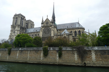 Obraz premium Notre Dame Cathedral side view with roof and spire, which was damaged by fire, Paris, France