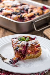 Yeast cake with plums and blueberries.
