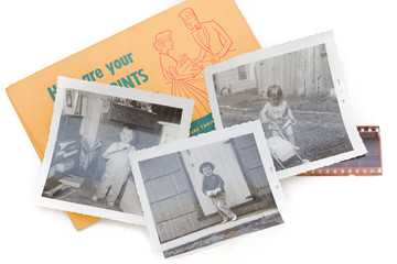 Three black and white snapshots with a photo envelope and piece of negative all vintage