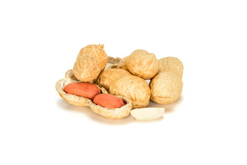 Peanuts. Four real whole nut with two kernels in shell isolated on white background. Peanut macro close up. Full depth of field.