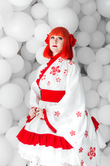 girl in kimano on the background of balls