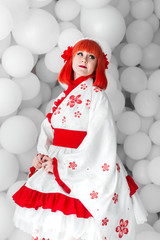 girl in kimano on the background of balls